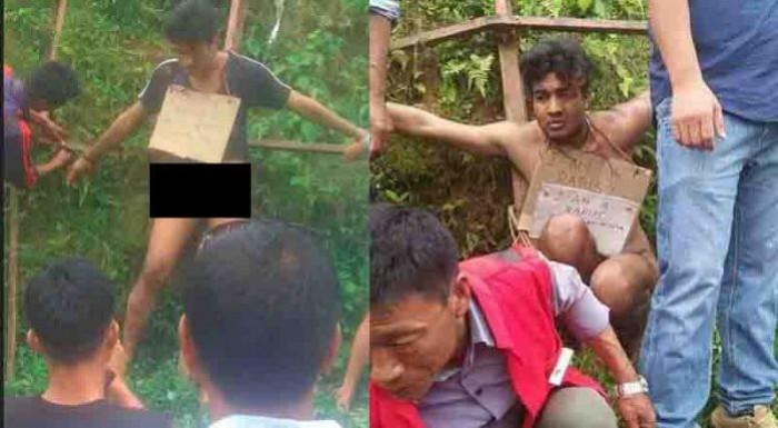 नागालैंड में भीड़ ने नाबालिग से बलात्कार के आरोपी की पिटाई कर उसे नग्न कर घुमाया. नागालैंड में भीड़ ने नाबालिग से बलात्कार के आरोपी की पिटाई कर उसे नग्न कर घुमाया.