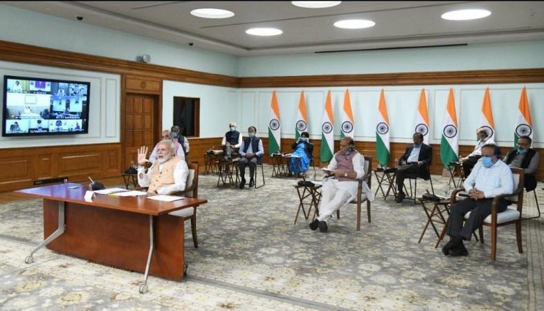 प्रधानमंत्री नरेंद्र मोदी ने सोमवार को पहली बार वीडियो लिंक के जरिये कैबिनेट की बैठक की अध्यक्षता की Modi Cabinet meet